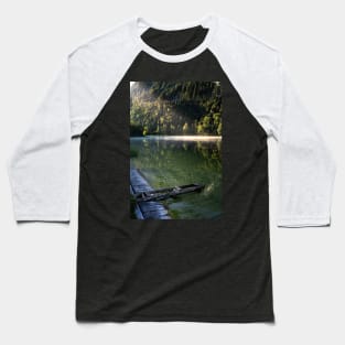 Ray of sunlight on misty lake. Wooden pier in front. Amazing shot of the Ferchensee lake in Bavaria, Germany. Scenic foggy morning scenery at sunrise. Baseball T-Shirt